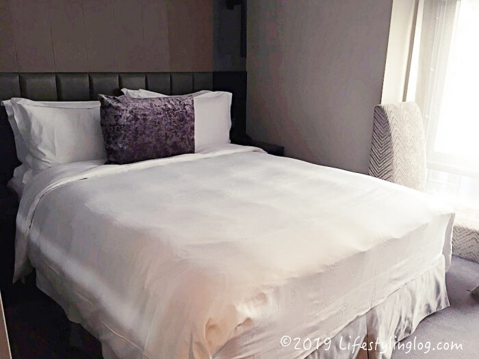 ザ タンゴ台北復興の客室にあるベッド